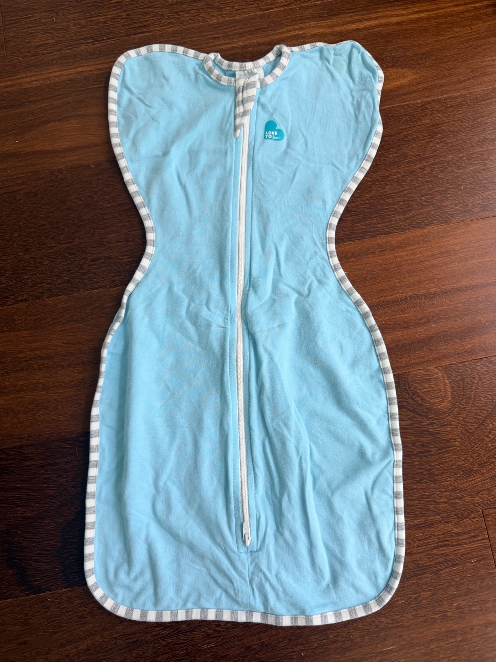 Love to Dream light blue swaddle sleep sack with striped trim